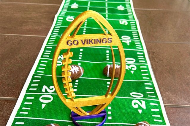 Custom 3D printed football centerpiece — a keepsake birthday centerpiece